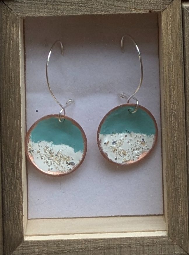 Light blue earrings and pendant cord
