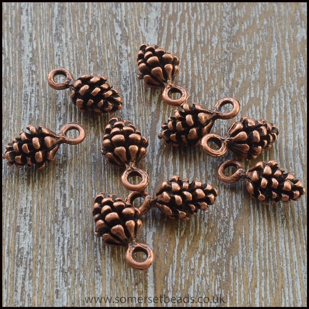 Tiny 3D copper pine cone charms for making jewellery