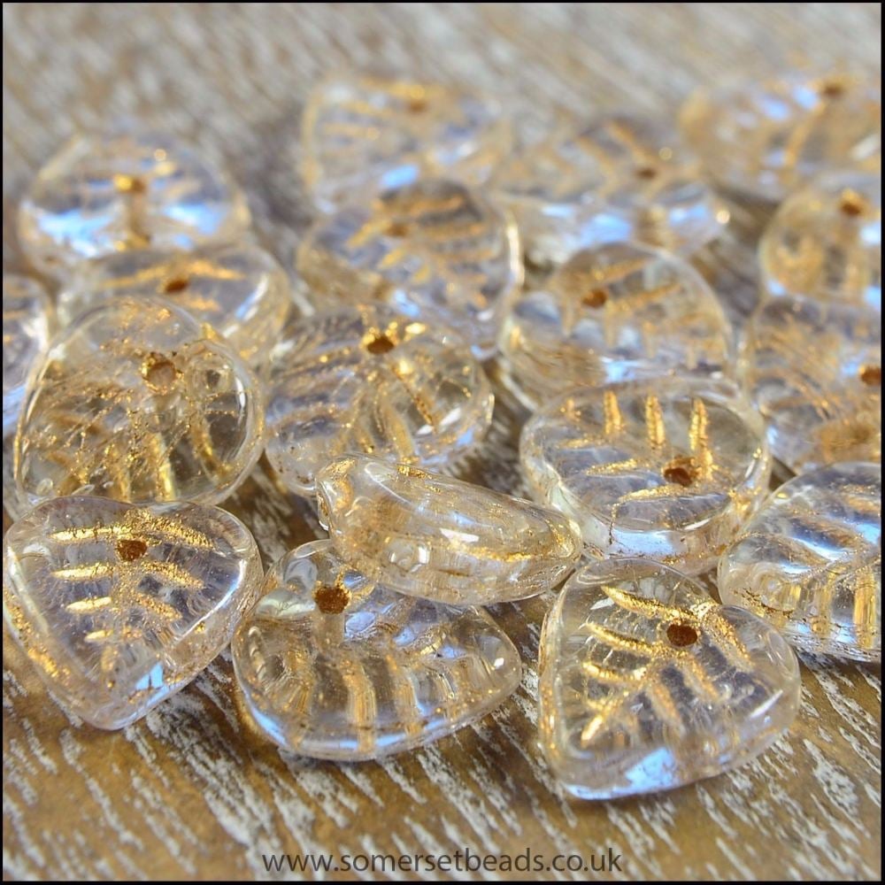 Czech Glass Pressed Leaf Shaped Beads - Crystal With Bronze Coating