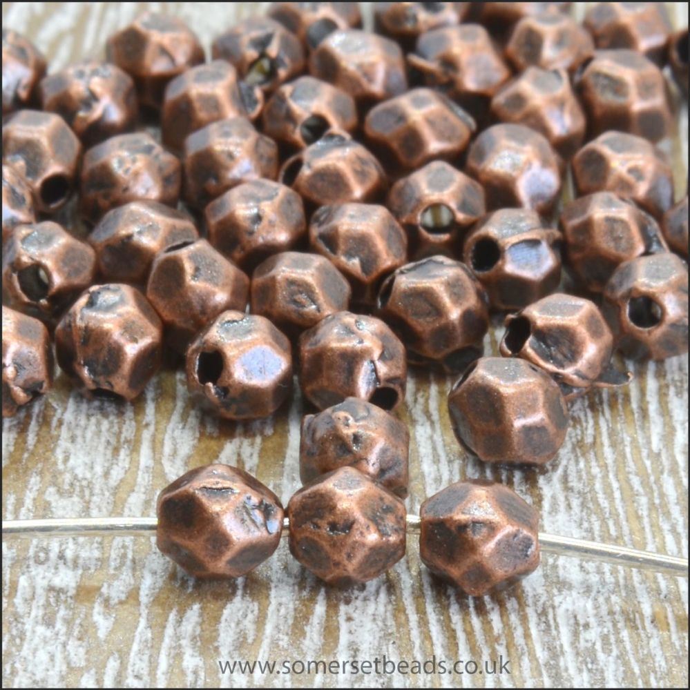 4mm Copper Faceted Oval Spacer Beads.