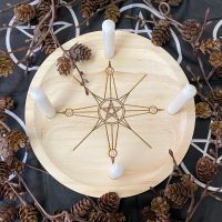 A Rustic Hand Crafted Wooden Spell Casting Plate with Compass and Pentagram
