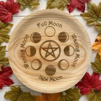 A Rustic Hand Crafted Wooden Spell Casting Plate with Moon Phase