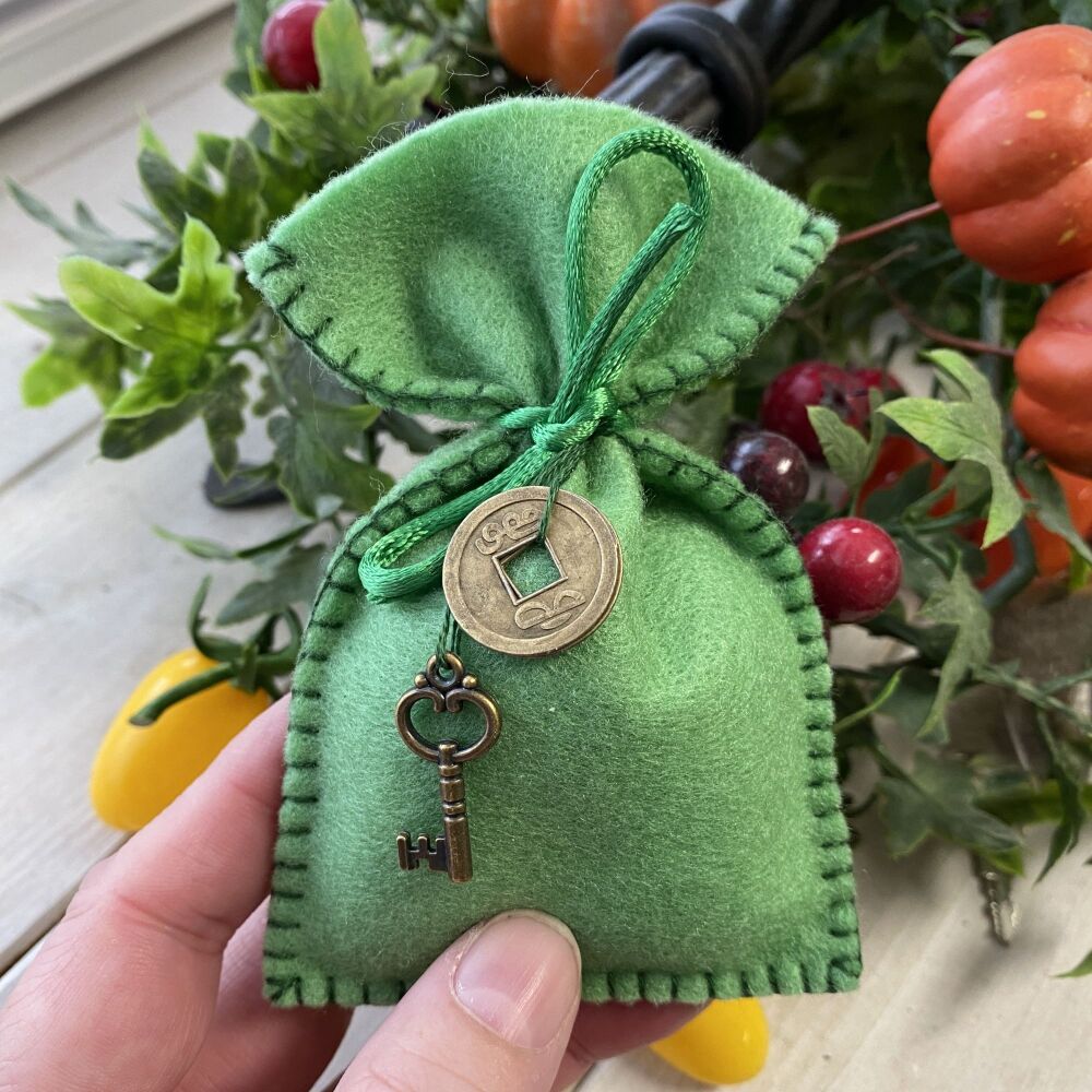 A Handcrafted Herb Mojo Bag made by Freya ~ Money Drawing with charms