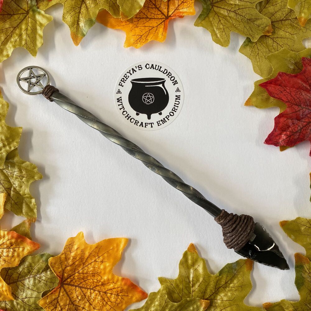 Athame with a Black Obsidian arrowhead blade and a twisted metal handle with pentagram