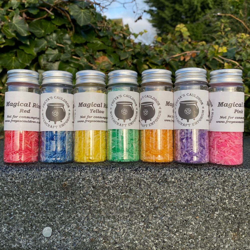 A set of Magical Rice in vials with screw on tops.