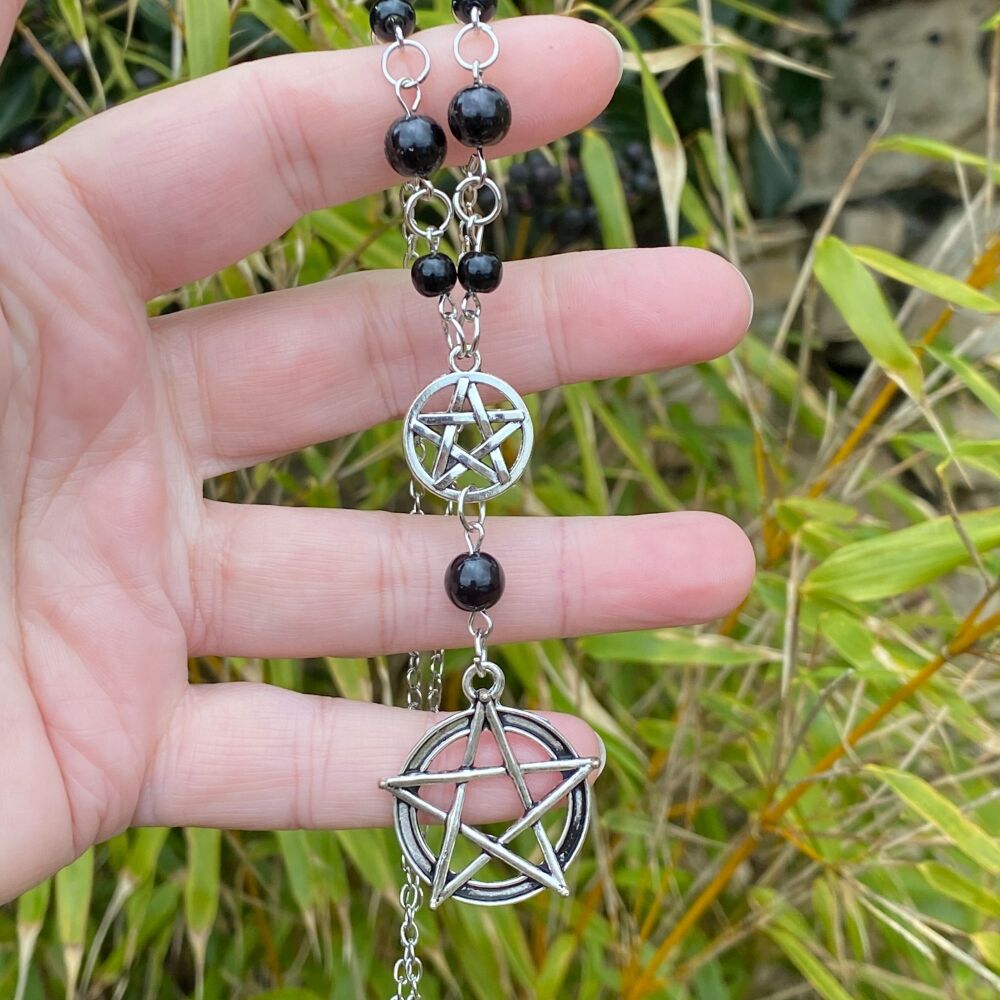 Pentagram pendant with black beads