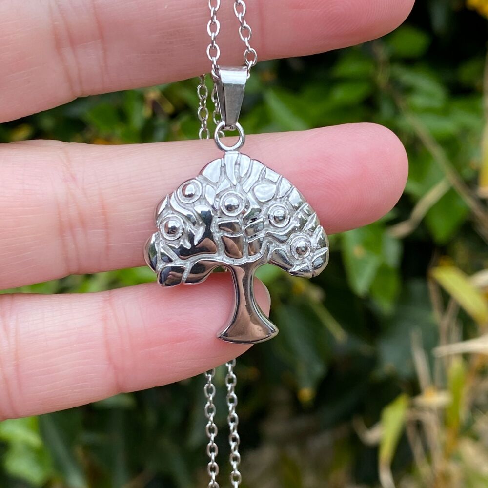 A Stunning Stainless Steel Pendant with Tree of Life design