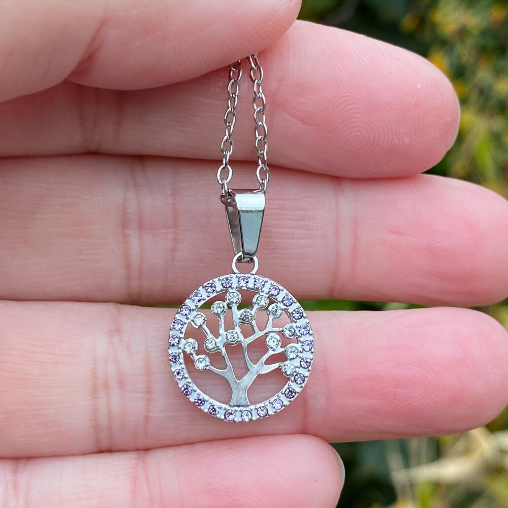 A Stunning Stainless Steel Pendant with Tree of Life design with stones