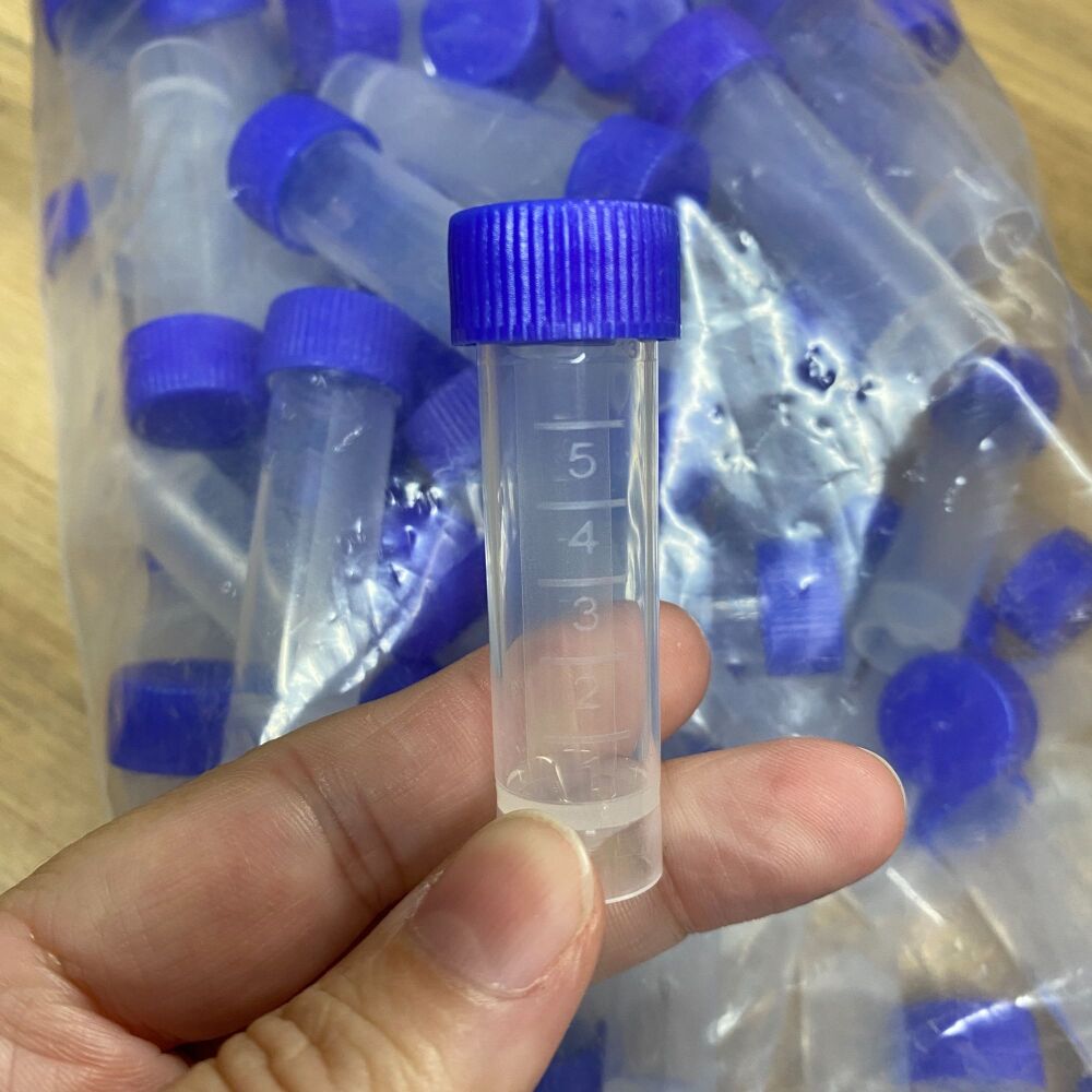 Approximately 100 plastic oil vials