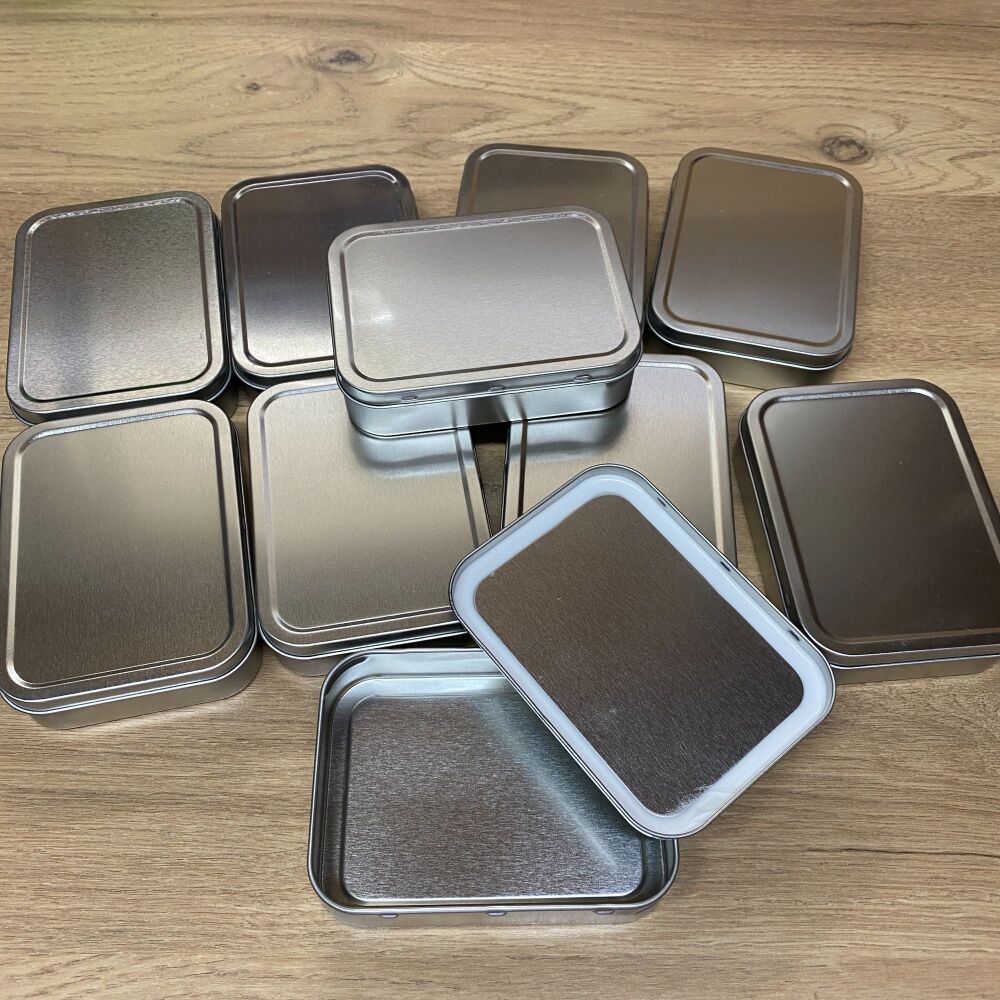 A collection of 10 tins perfect for crafts, spells and storage