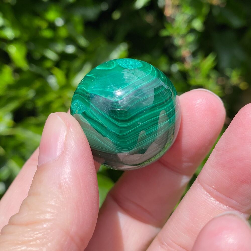 Malachite sphere with stand