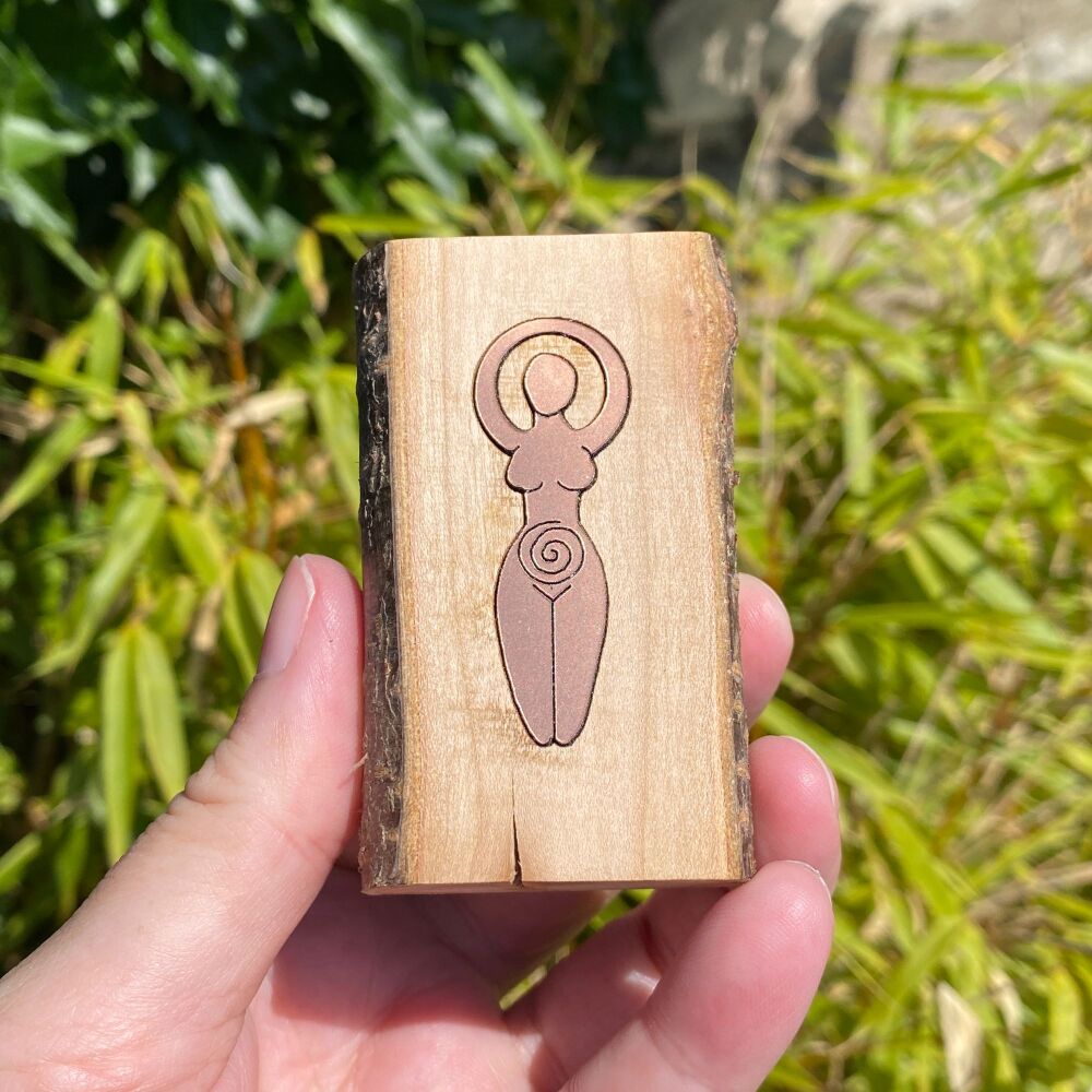 A Handcrafted Cherry Wood Candle Holder with Goddess each side