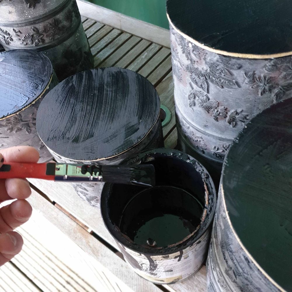 Painting the plinths with black chalk board paint