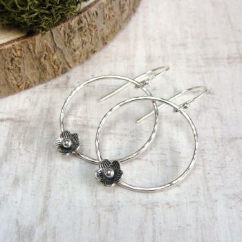 Sterling Silver Hammered Circle Earrings with Tiny Flower Embellishments
