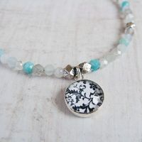 Faceted Multi Gemstone Beaded Bracelet with Sterling Silver Floral Illustration Charm