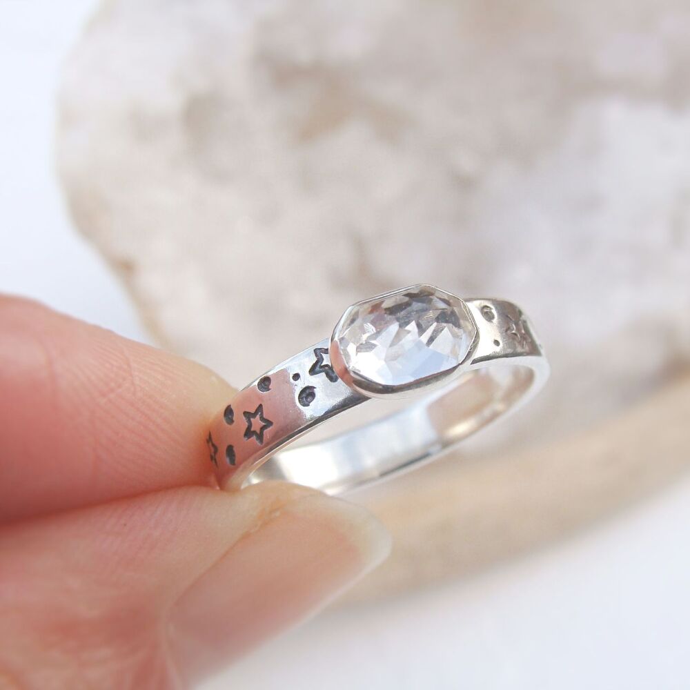 Sterling Silver Star Stamped Band with Faceted Oval White Topaz