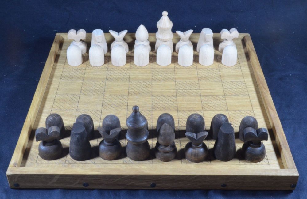 Reconstruction of Caxton’s chess set, shown on our medieval chess board
