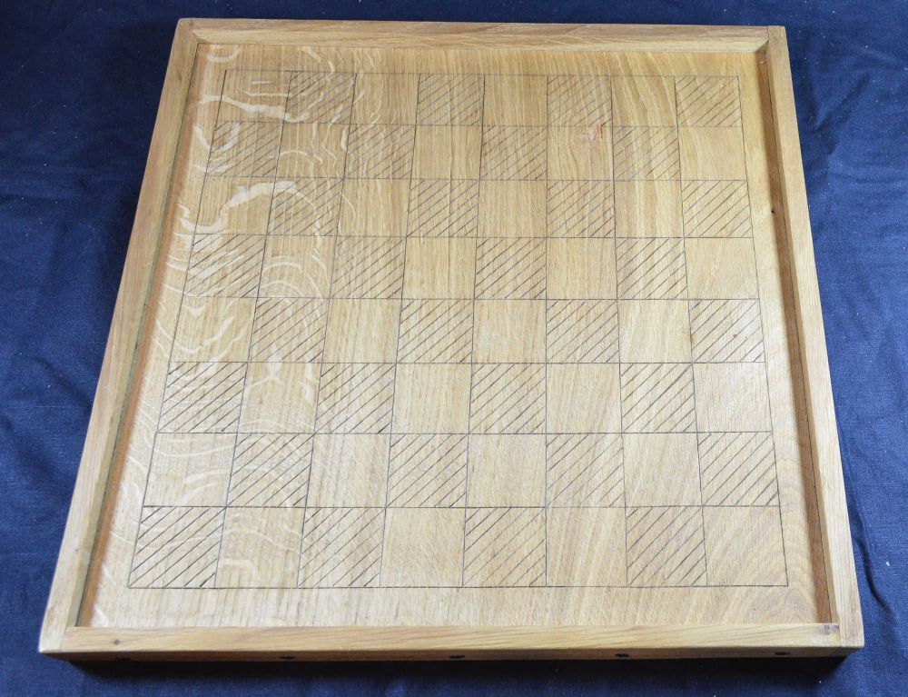 Unpainted quarter-sawn oak chess board of early medieval style