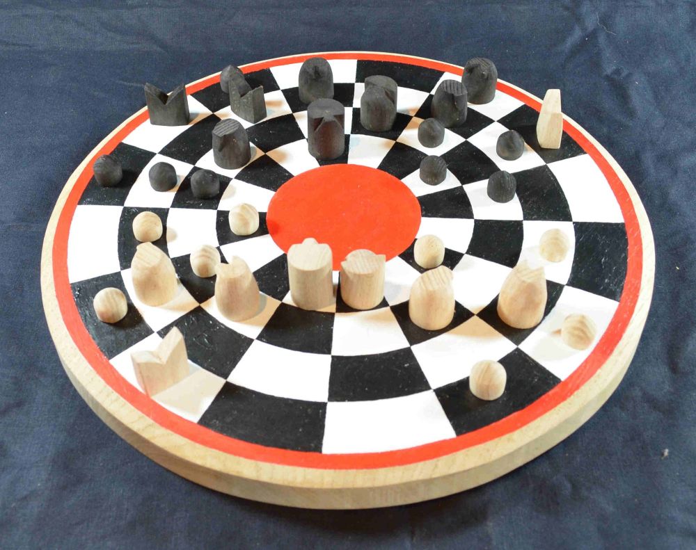 Circular chess board with early medieval chess pieces