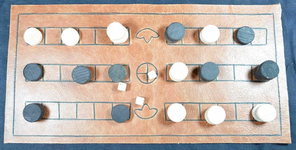 Duodecim Scripta or Alea, 3-row leather board with dice; game in play