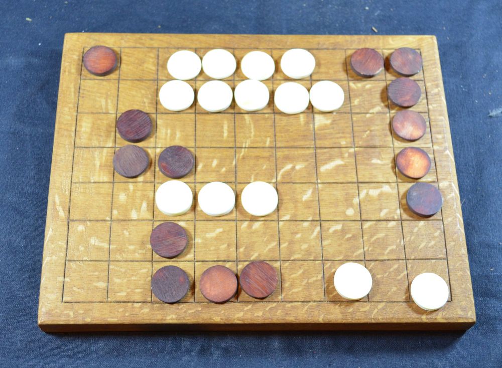 Oak Ludus Latrunculorum board, bone counters, with game in play