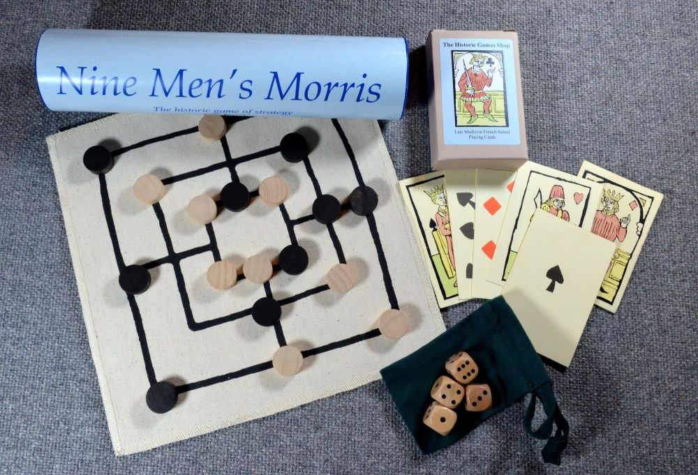 Fifteenth century reproduction playing cards; Nine Men’s Morris board game;