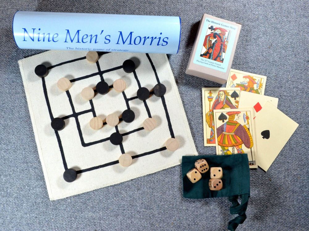 Sixteenth century reproduction playing cards; Nine Men’s Morris board game;
