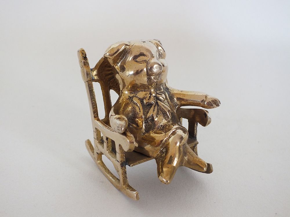 Brass Pig In Rocking Chair