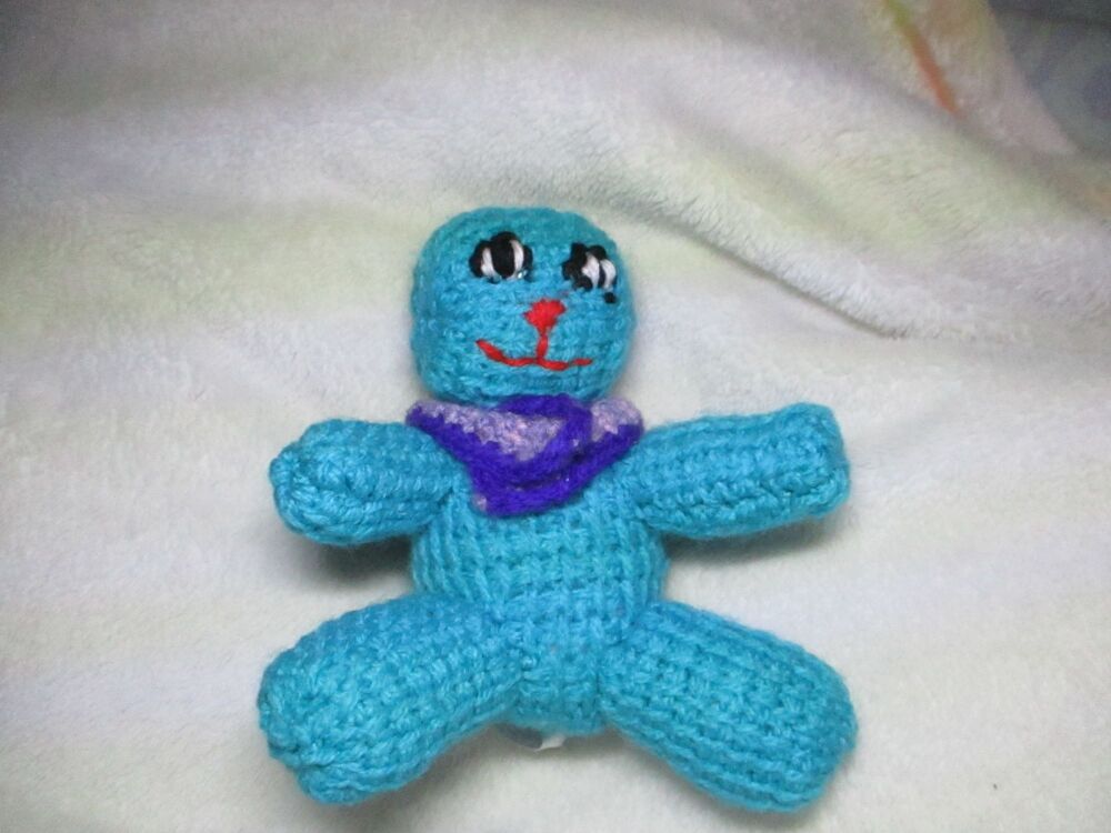 Vivid Cyan Blue Crocheted Kito-Pal with round head and purple shawl