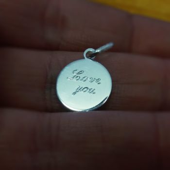 Medal engraved with Love You message