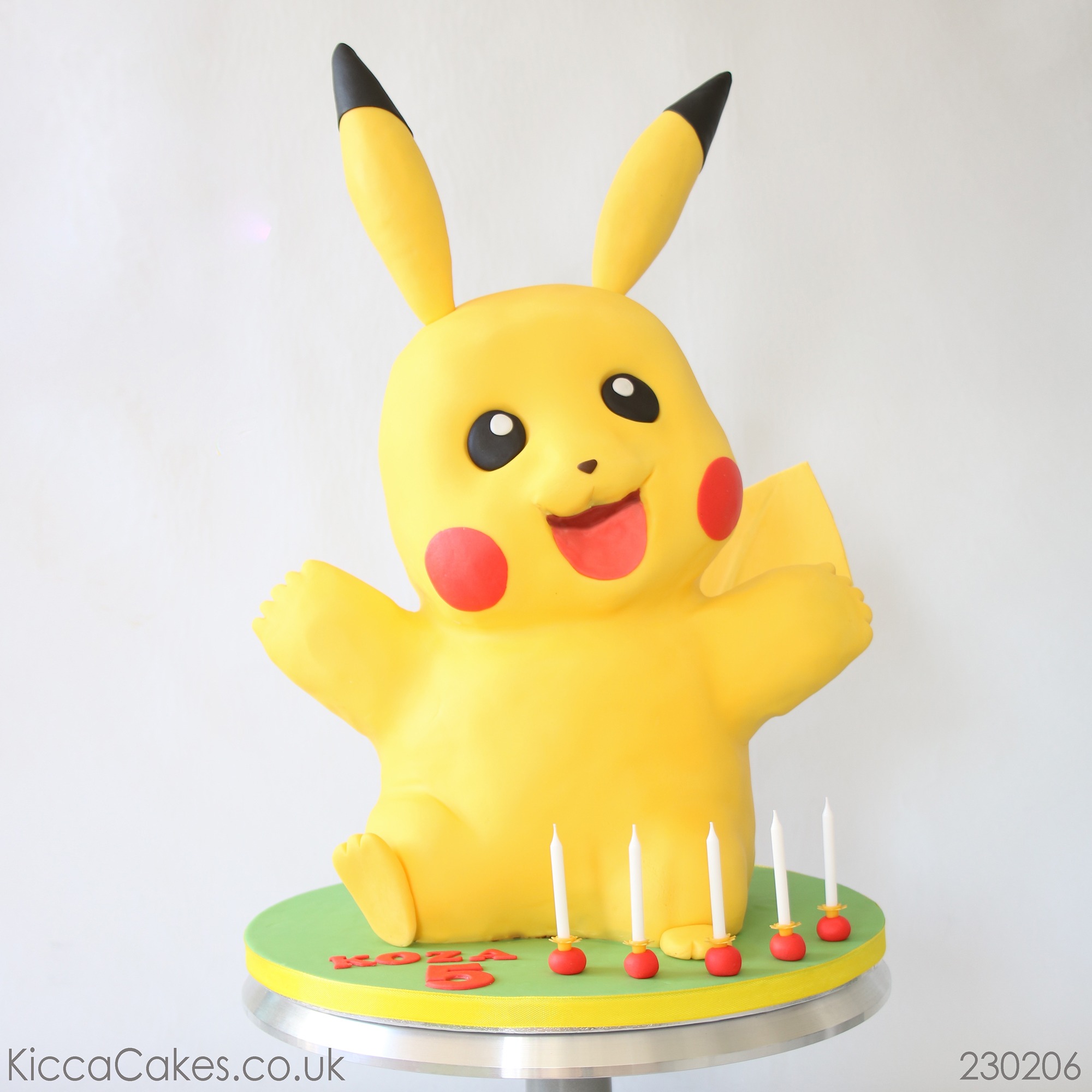 Sculpted cake in the  shape of Pikachu