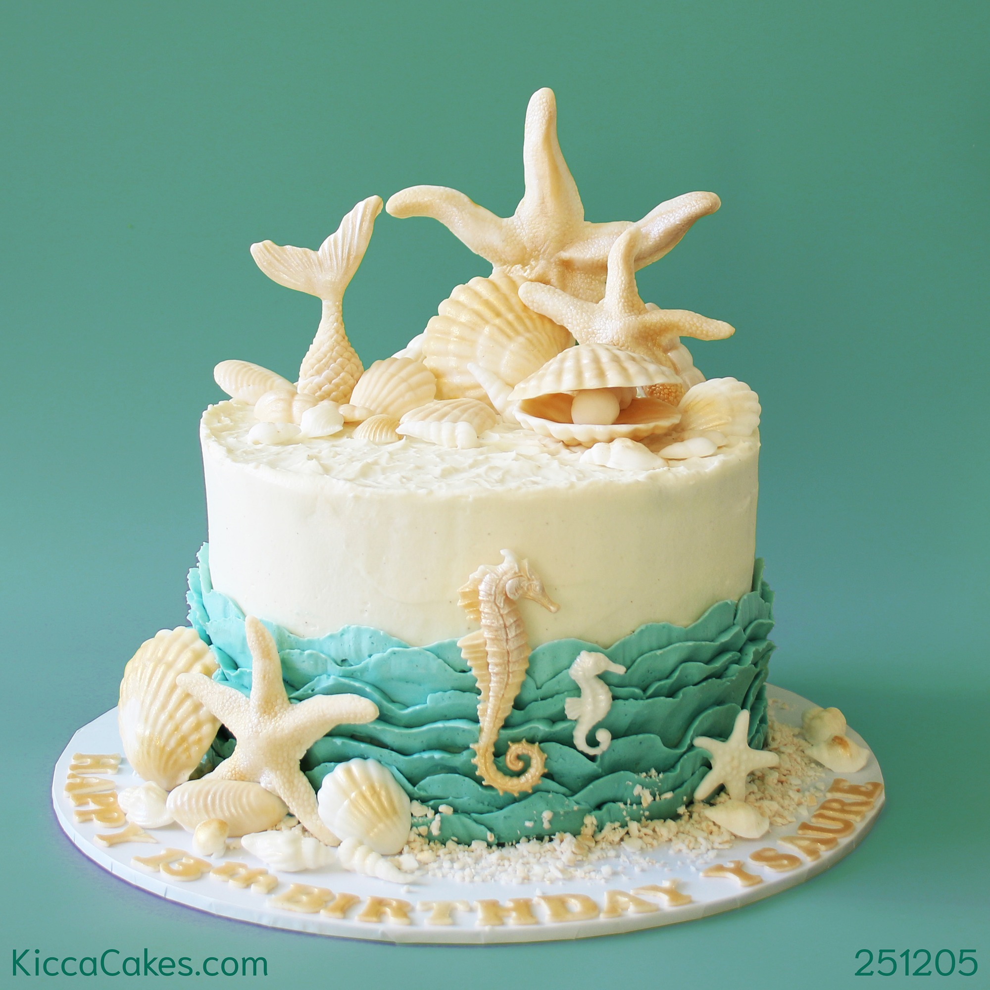 Giant cupcakaes with butterflies and flowers.