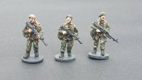 BAOR30 British Army in berets GPMG and SLR patrol poses