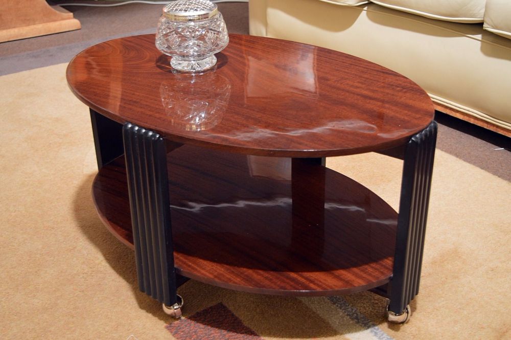 Attractive Art Deco mahogany & ebonised coffee table on chrome castors