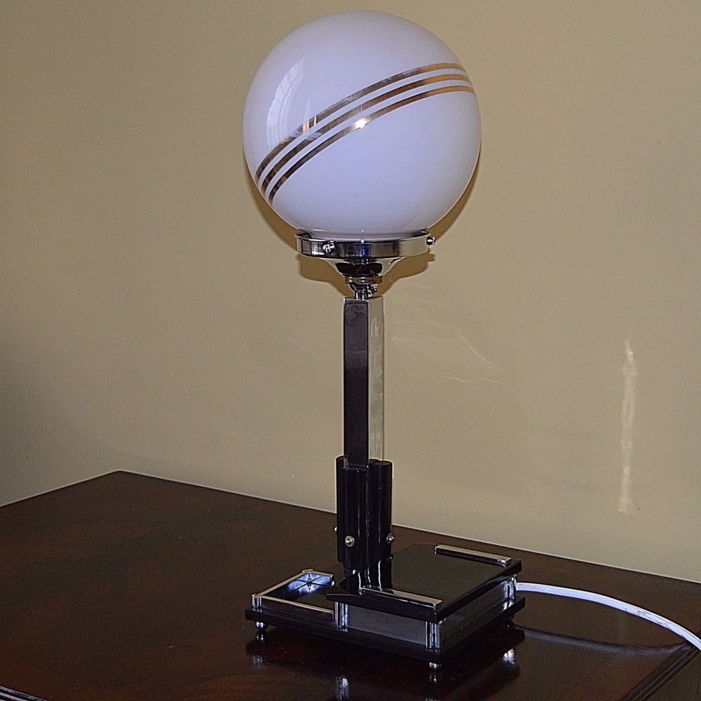 Fine Art Deco table lamp with original shade.