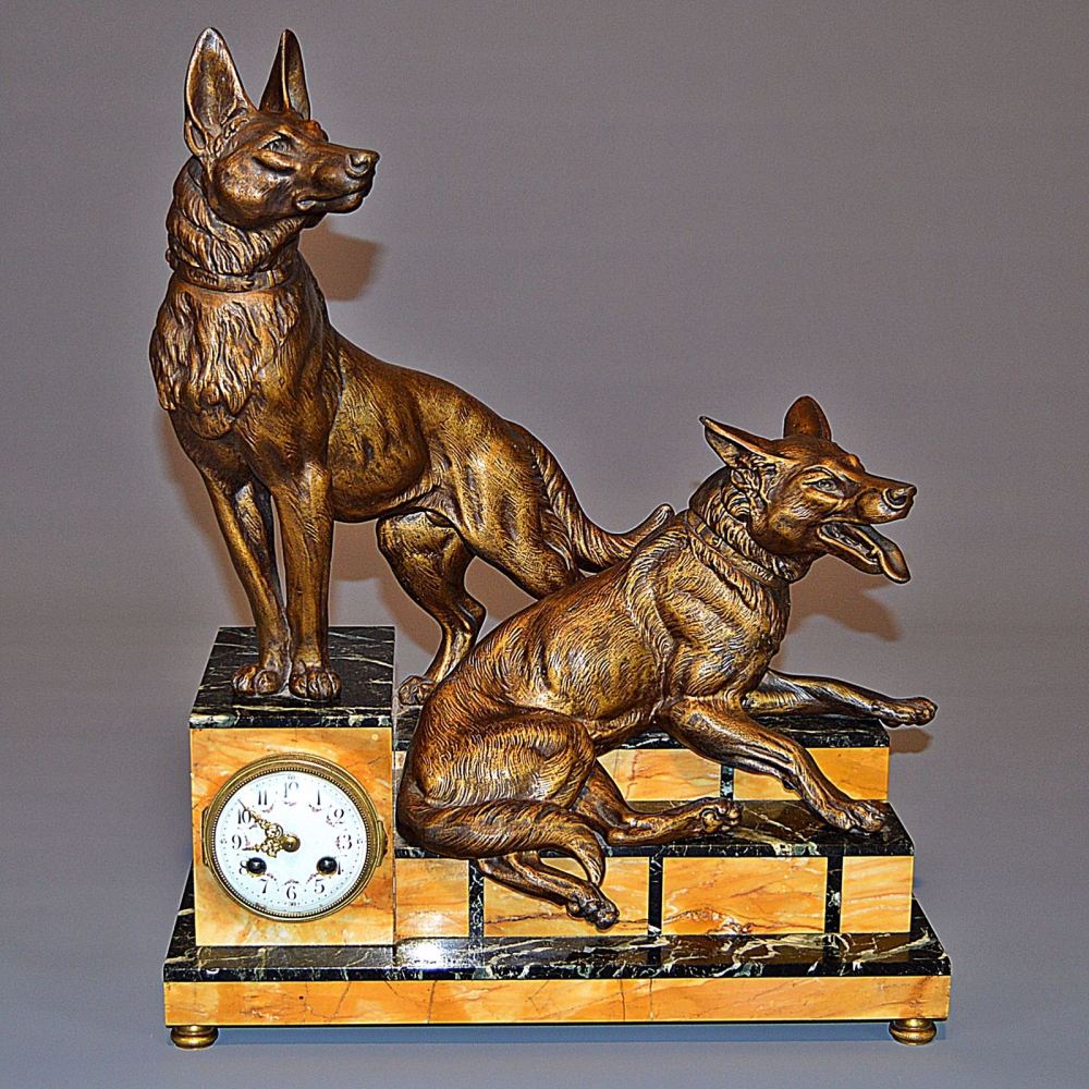 Superb Art Deco clock mounted with dogs by Carvin