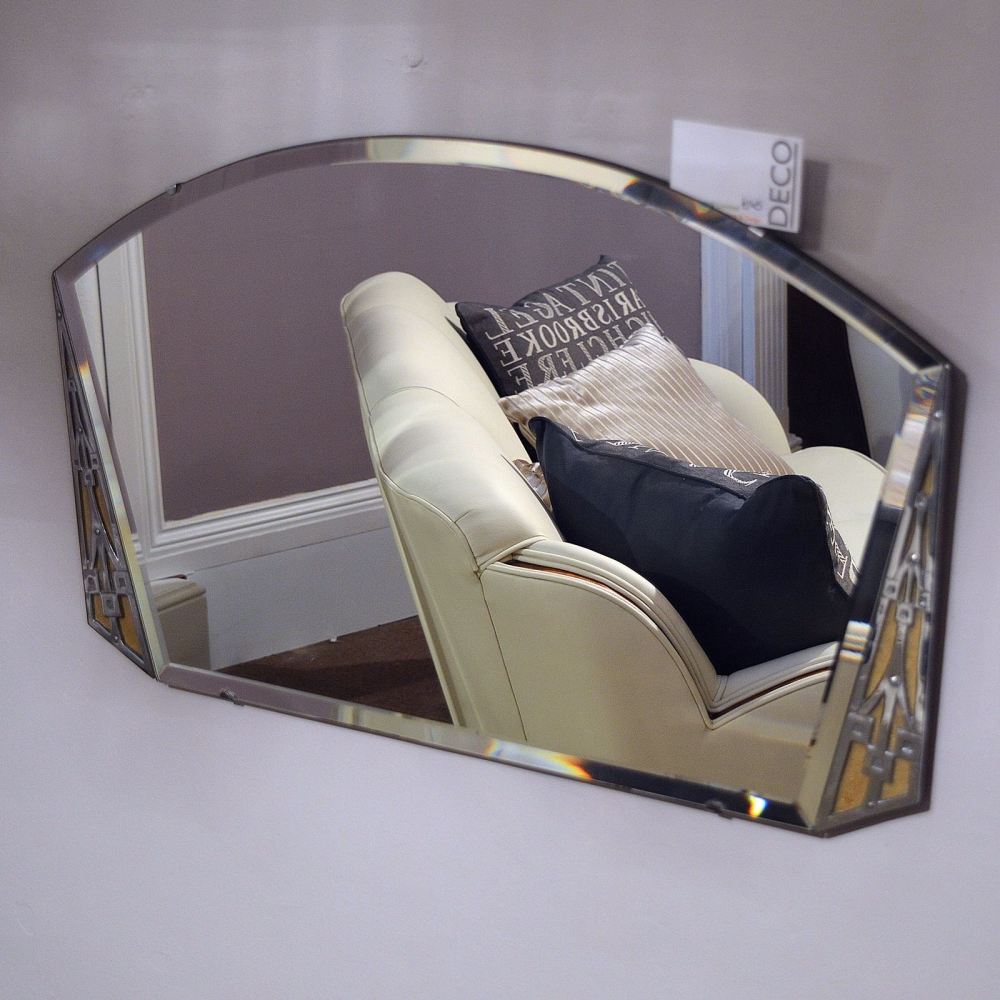 Art Deco wall mirror with chromed detailing.