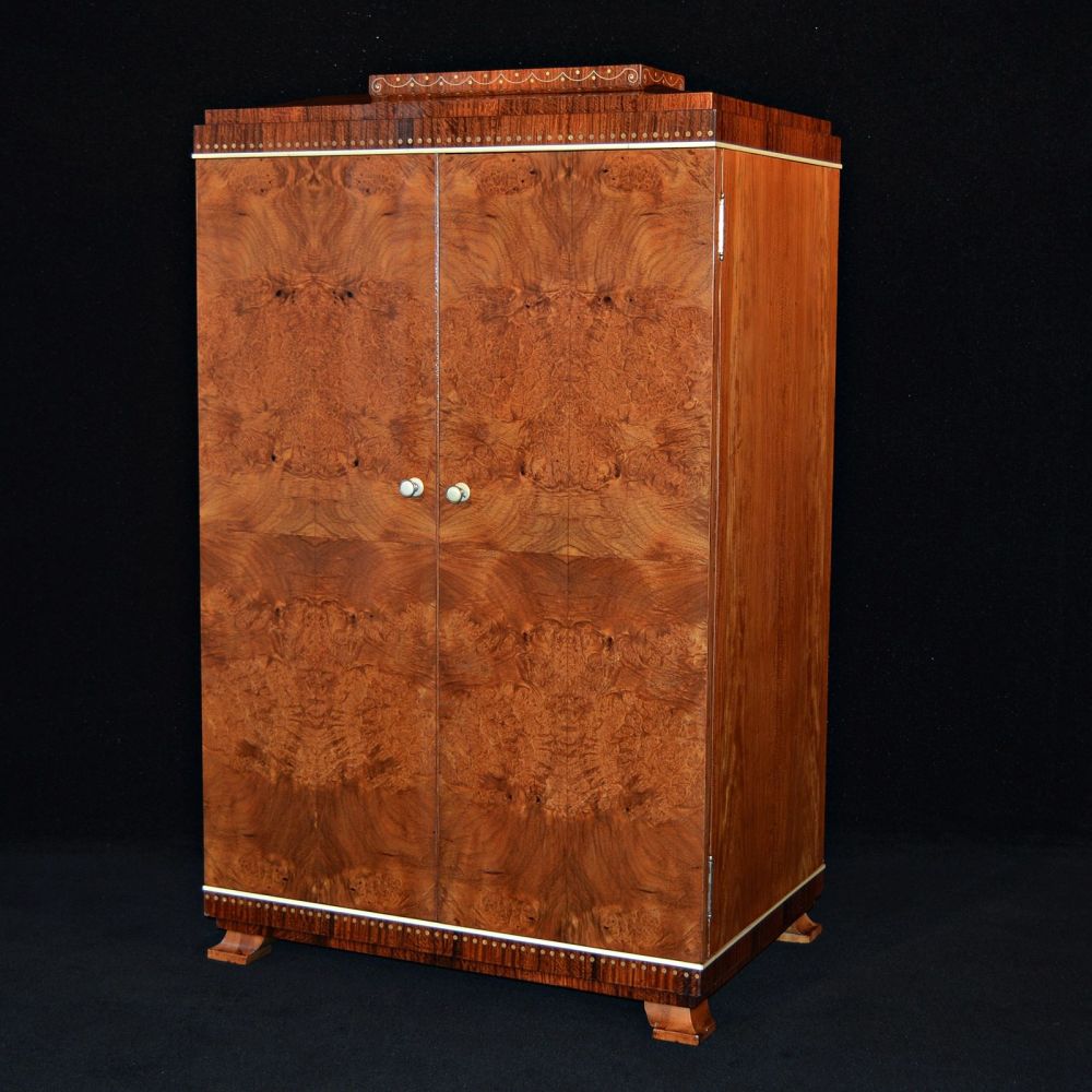 Waring & Gillow. An exceptional amboyna cabinet.