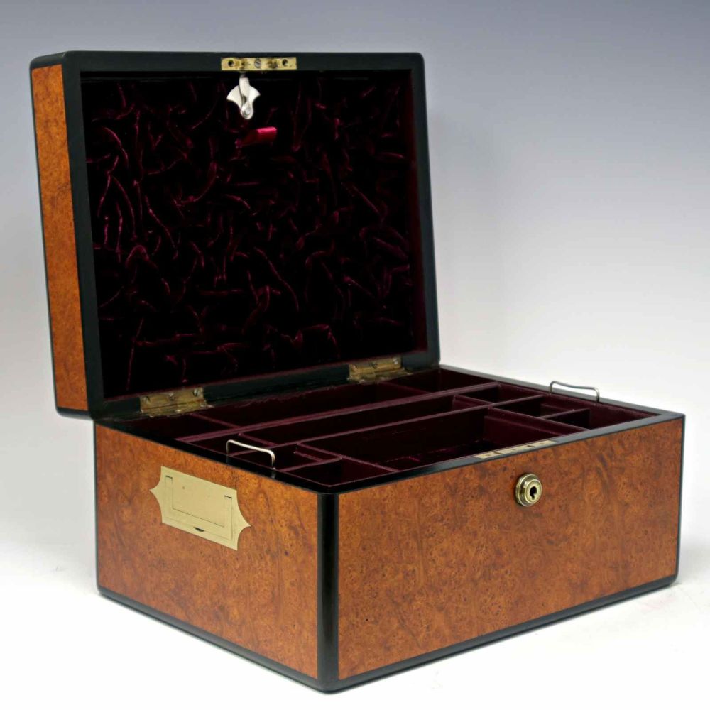 Antique amboyna jewellery box by Fuller & Levet.