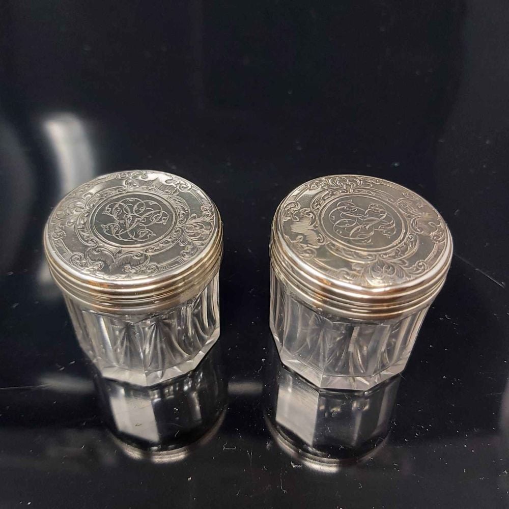Pair of antique sterling silver dressing table jars.