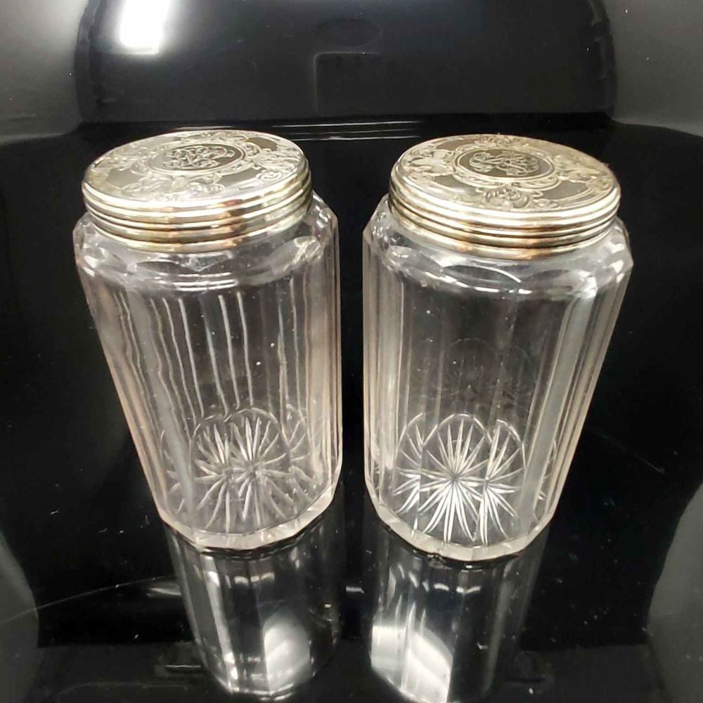 Pair of antique sterling silver dressing table jars.