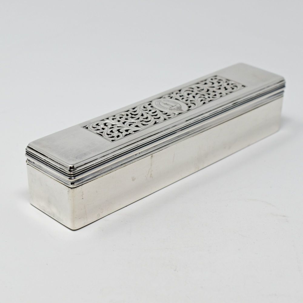 Fine sterling silver table box with silver gilt interior.