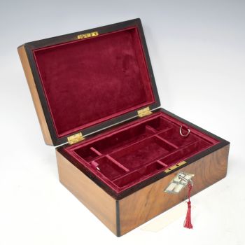 Antique walnut and inlaid jewellery box.