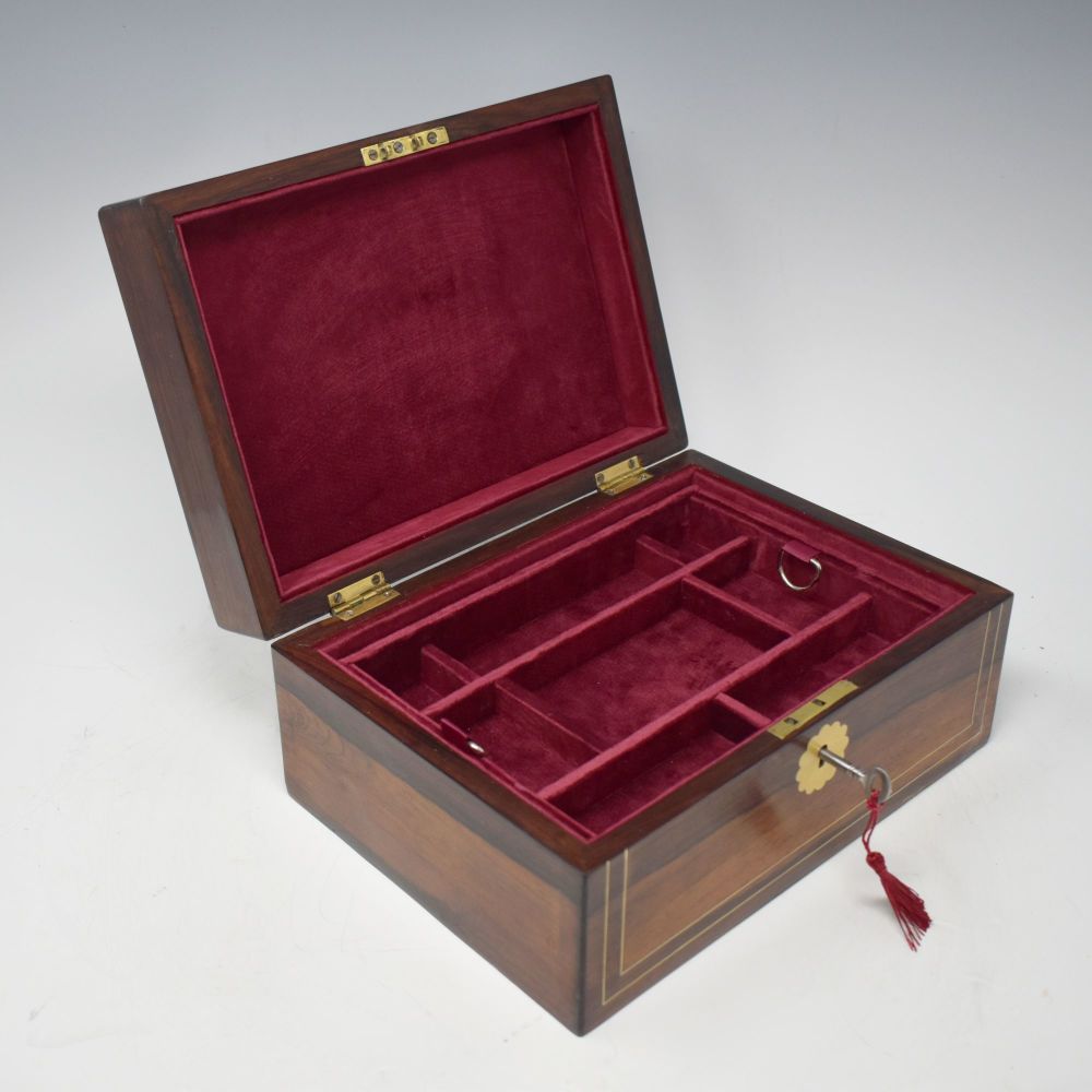 Antique rosewood and inlaid jewellery box.