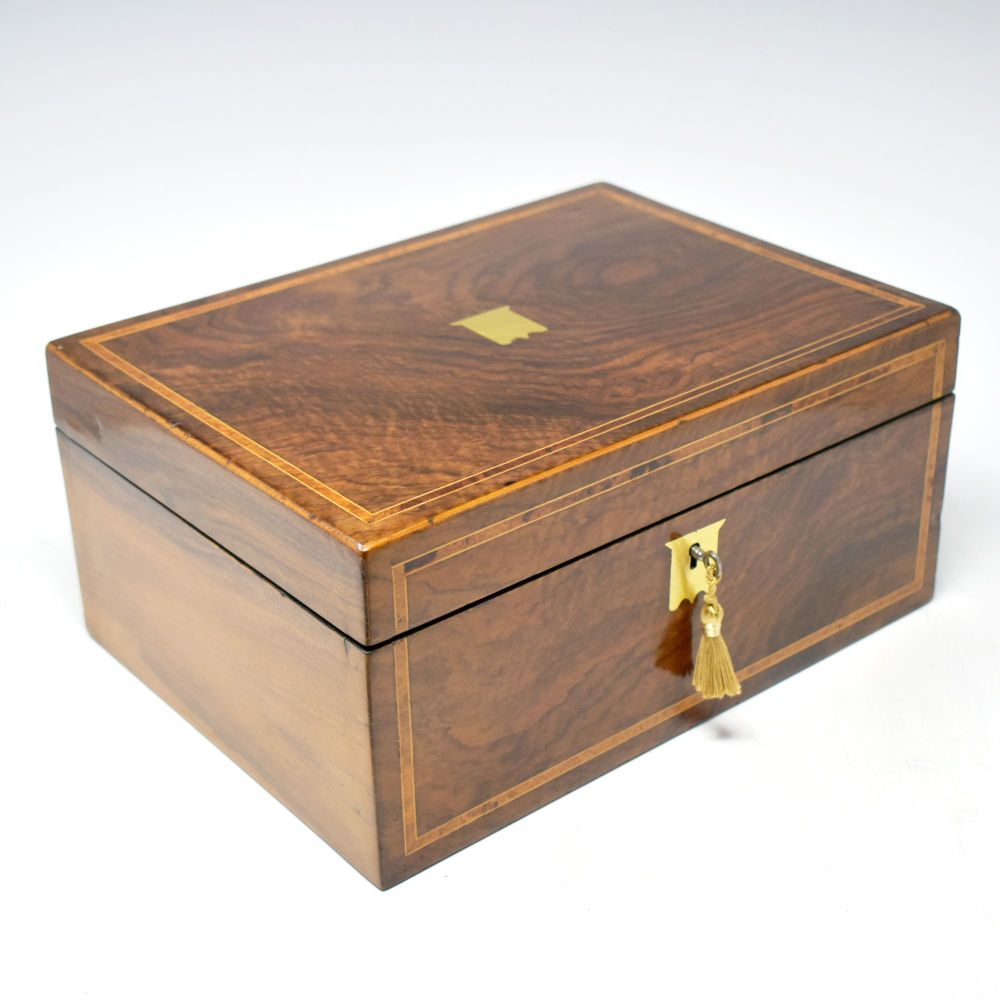 Antique figured walnut jewellery box.
