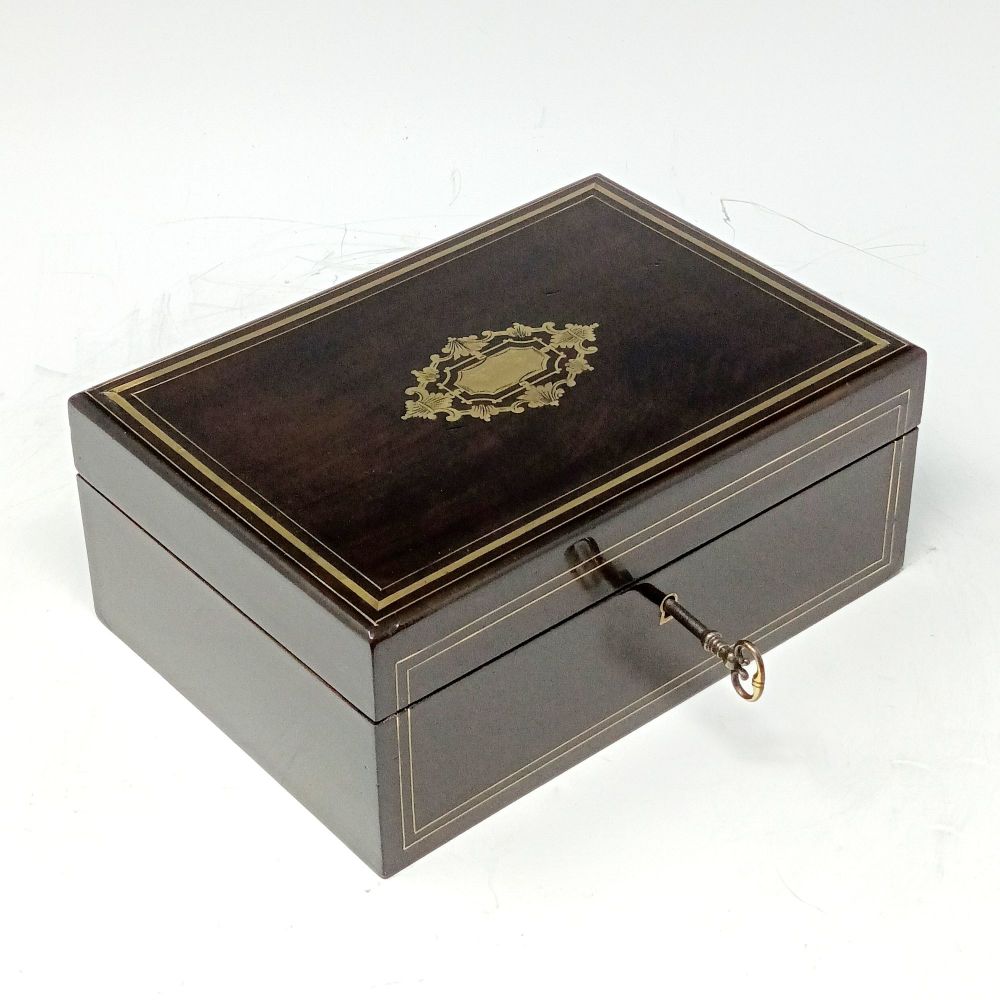 Antique ebonised & brass inlaid jewellery box.