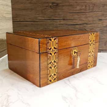 Antique walnut box with marquetry inlay.
