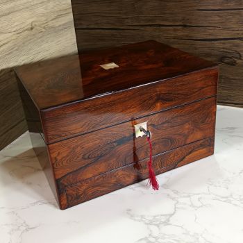 Antique rosewood jewellery box by Parkins & Gotto.