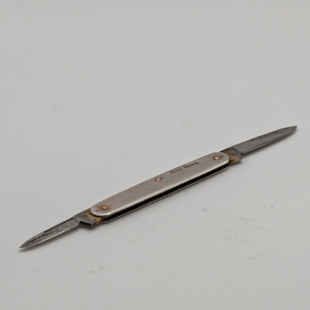 Asprey, London, A fine silver penknife. 1912