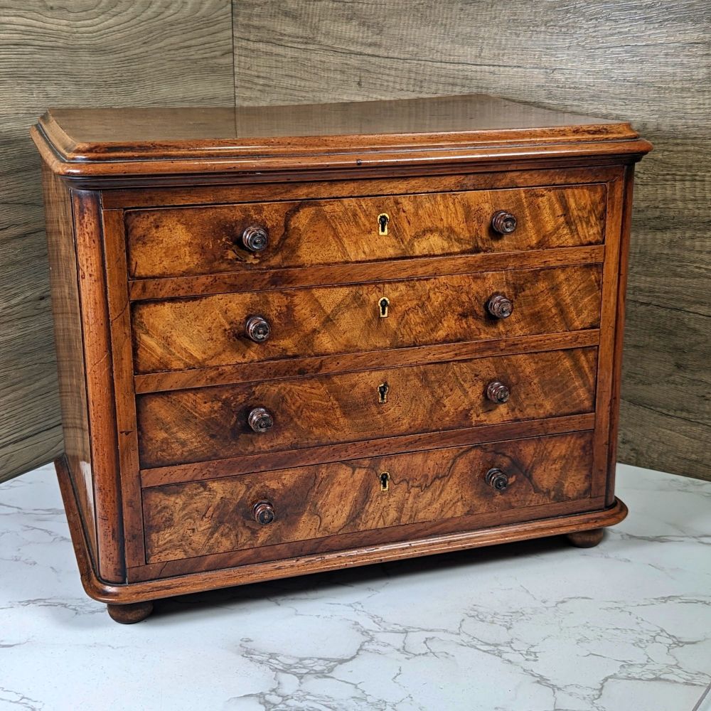 Fine quality Victorian burr walnut apprentice chest.